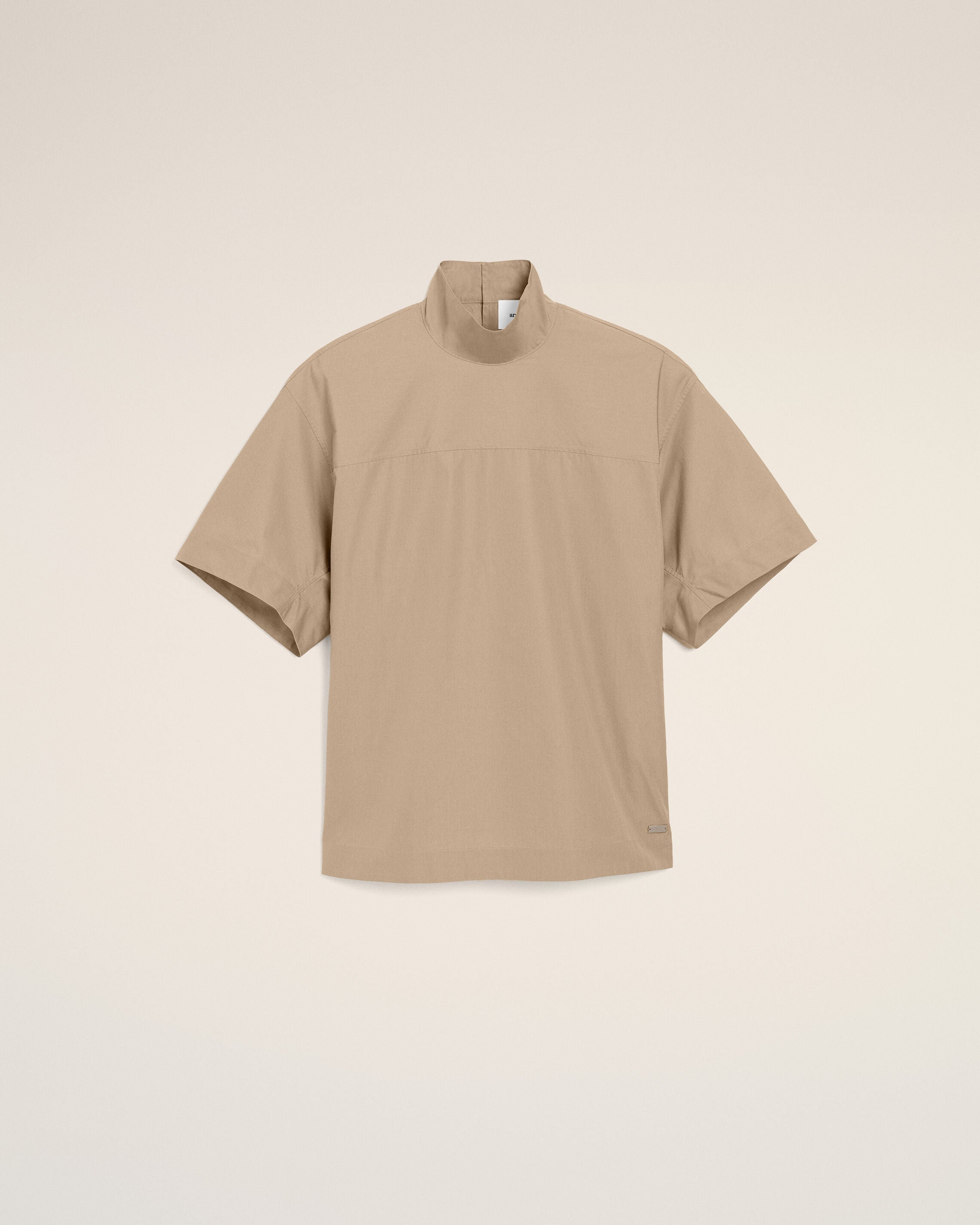 Beiges Baumwoll-T-Shirt mit Stehkragen und Knöpfen - 1
