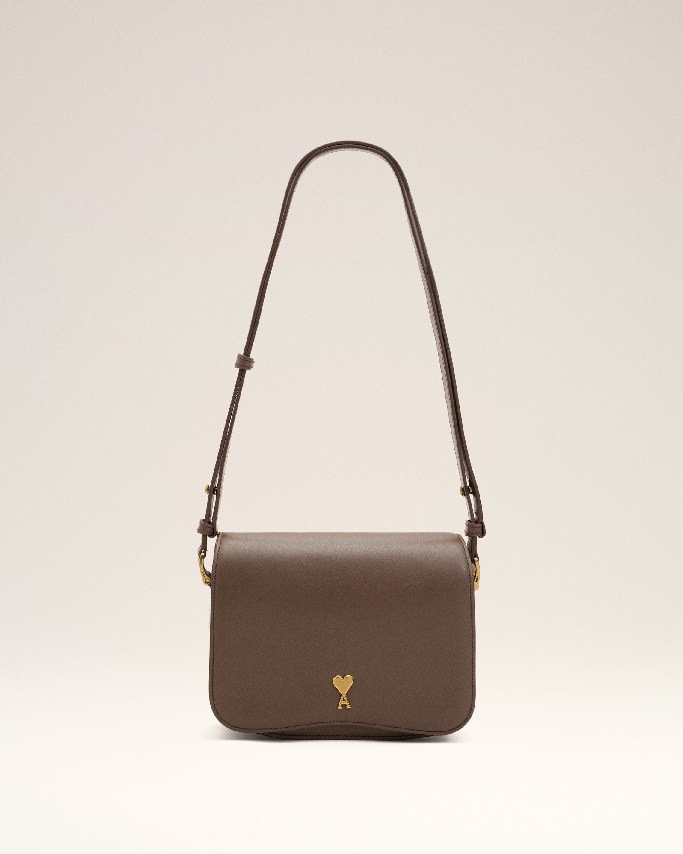 BLACK/VIBRATED BRASS Black cowhide leather Paris Paris bag | Ami Paris