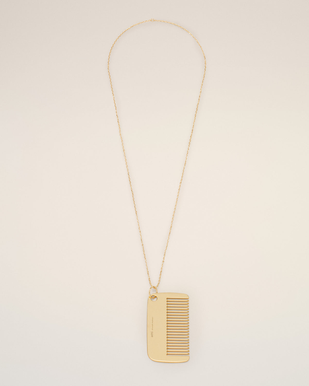 Collar con colgante de peine en latón dorado - 1