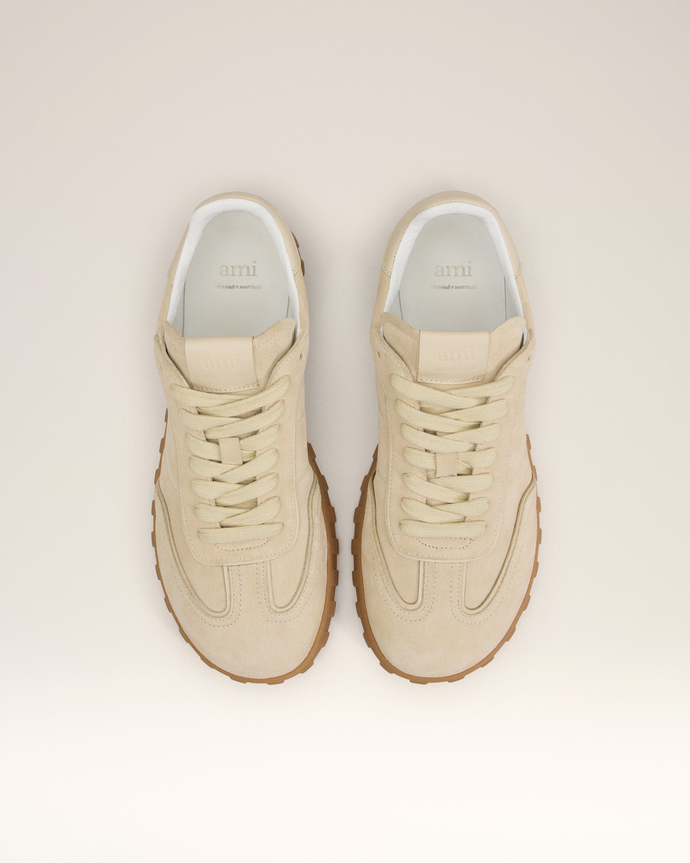BUTTER Low Top Step Sneakers | AMI PARIS
