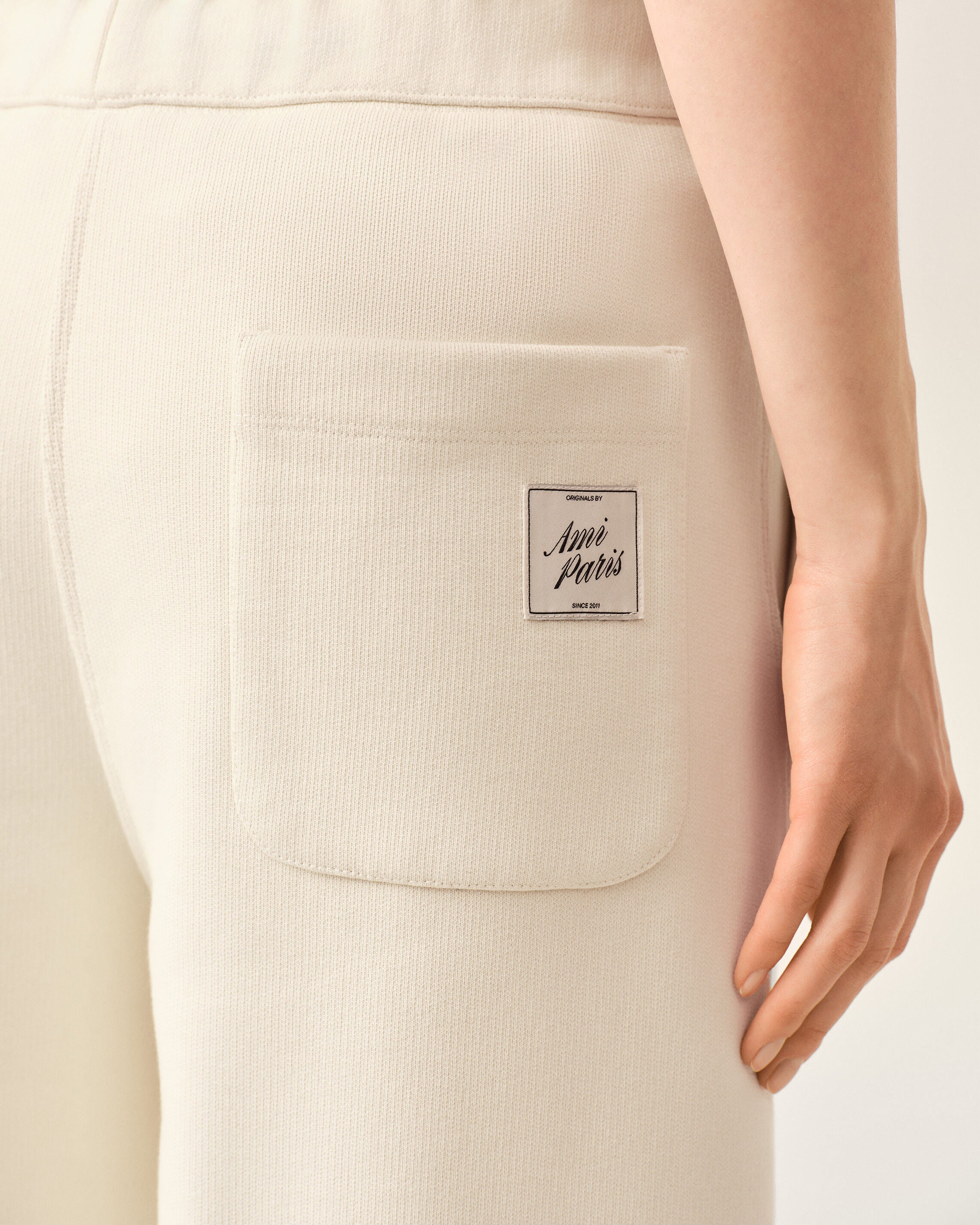 White cotton track pants with heritage Ami Paris label - 11